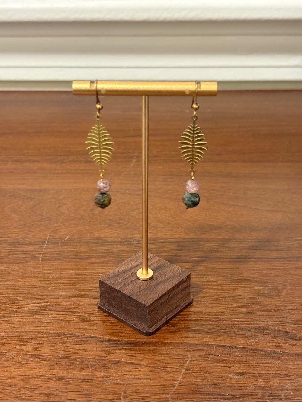 Brass fern leaf charm and pink and green gemstone bead dangle earrings